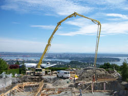 Pump truck set up alongside forms ahead of a scheduled pour